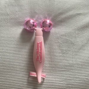 The Skinny Confidential pink balls face massager